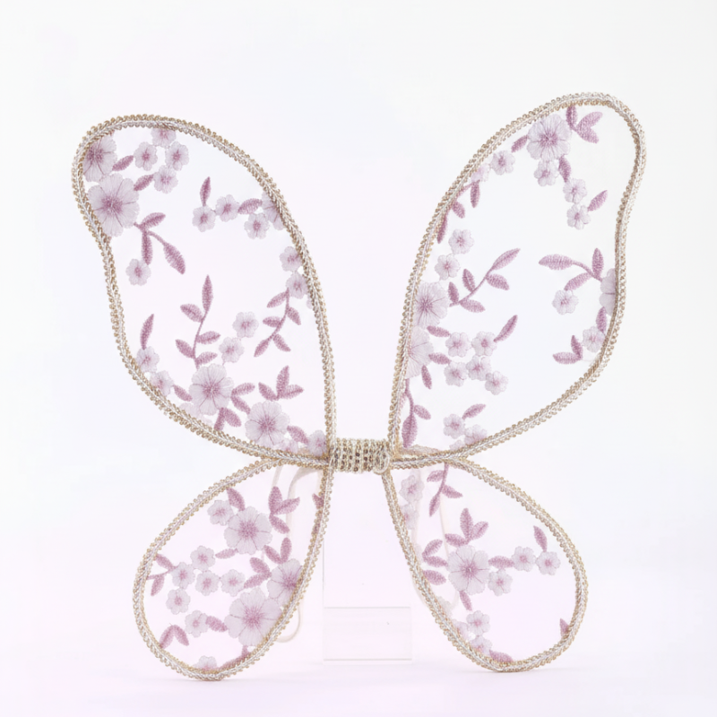 Butterfly-shaped decorative item with floral pattern on a white background