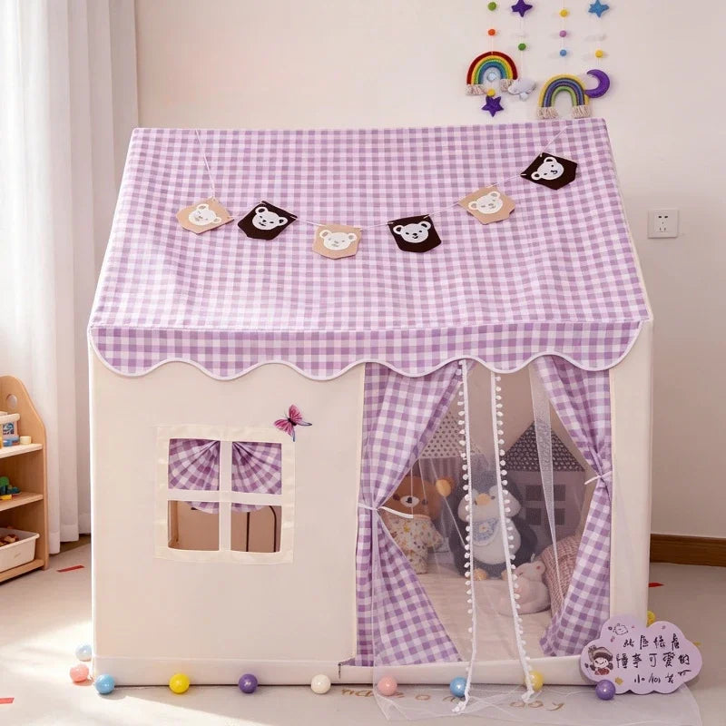 A children's playhouse tent with a purple and white gingham patterned roof and curtains, featuring a white frame, decorative animal face patches on the roof, a butterfly decal, and a small ball pit on the floor.