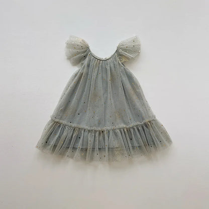 Children's tulle dress with ruffled sleeves on a white background