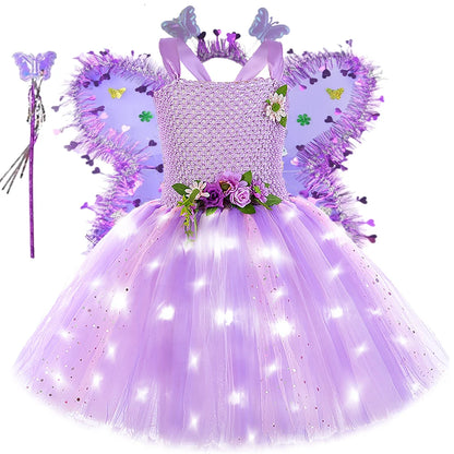 Purple fairy costume with LED lights, wings, wand, and headband on a white background