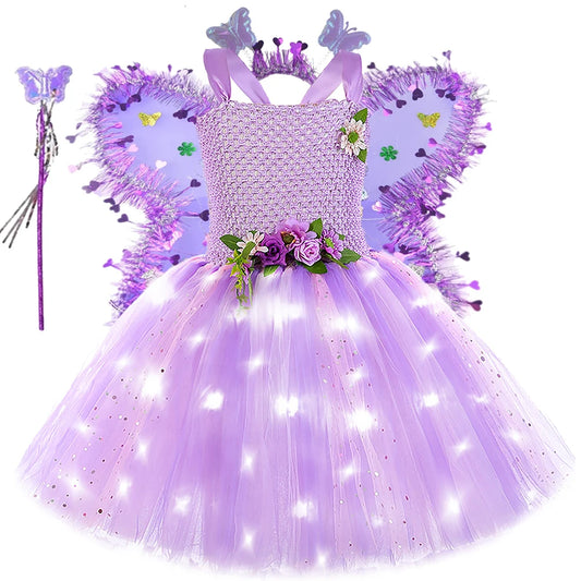 Purple fairy costume with LED lights, wings, wand, and headband on a white background
