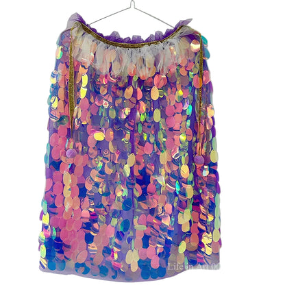 Multicolored sequin skirt on a hanger against a white background